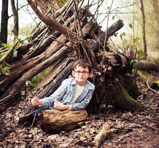 Boy Playing in Trees_credit iStock