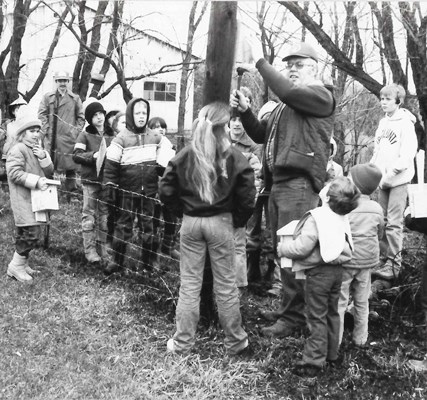 Don and Uncle Ike hanging birdhouses