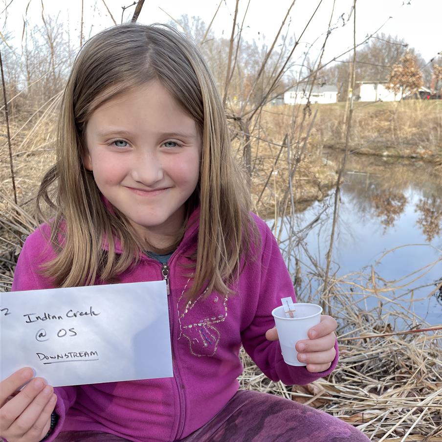 Young girl with Salt Watch materials