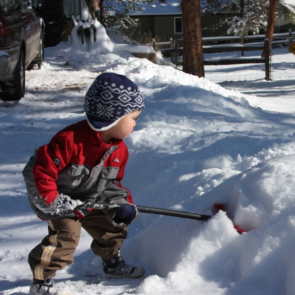 Boy shoveling snow. Credit David Gutierrez.