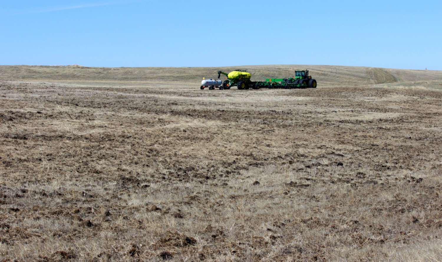 plowing up prairie_ND_credit Krista Lundgren USFWS