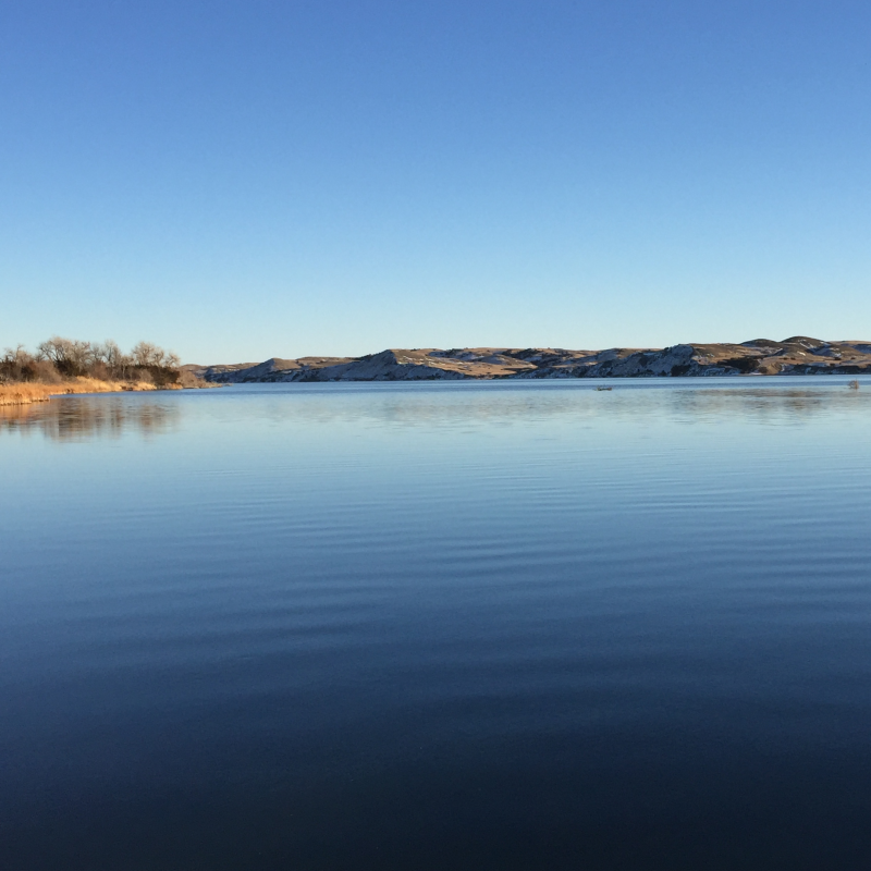 Blue sky reflecting in the Missouri River - credit Paul Lepisto