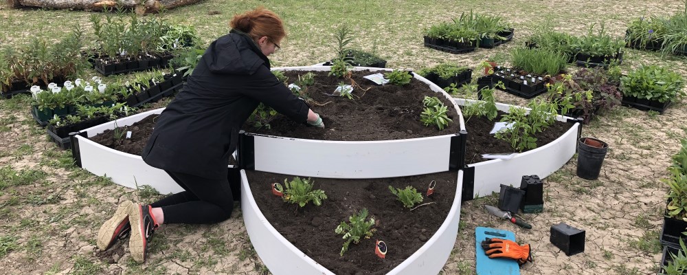 Chapter member working in garden