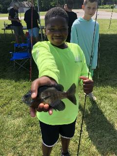 Kid with fish