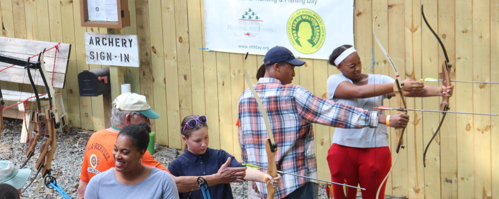 People trying archery