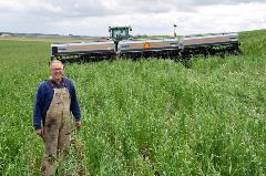 Farmer with cover crops - credit Lynn Betts, Natural Resources Conservation Service