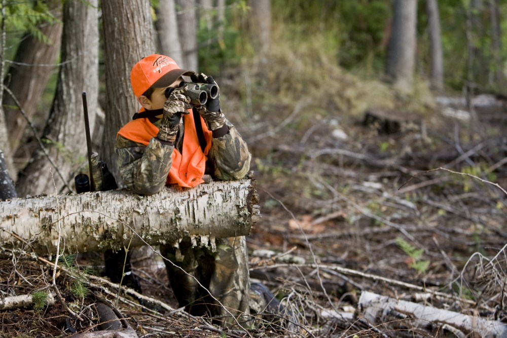 Hunter with binoculars